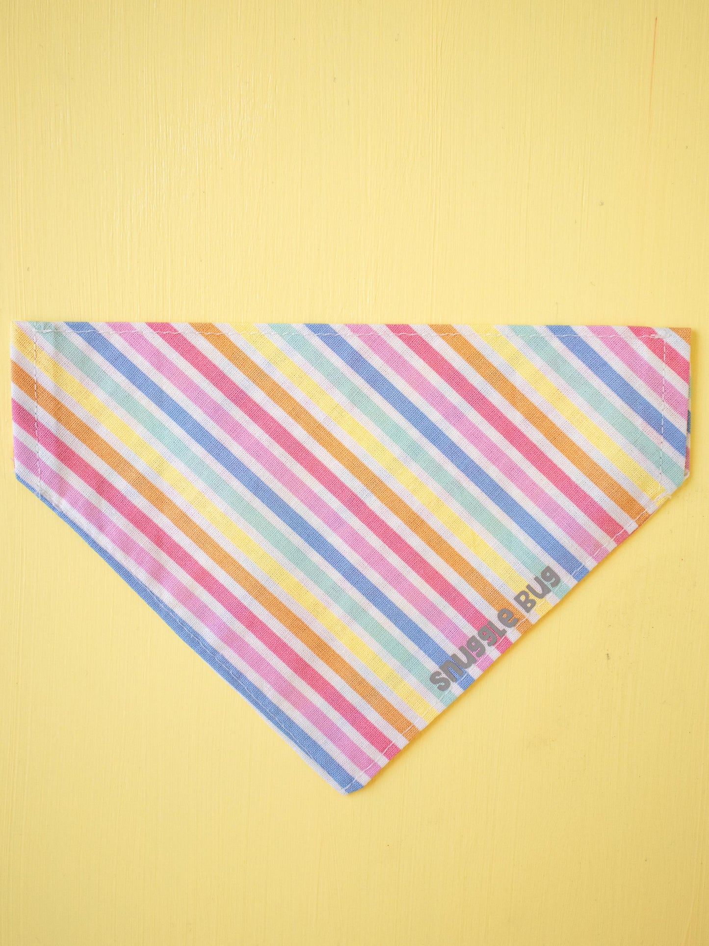 Colorful striped bandana on a yellow background