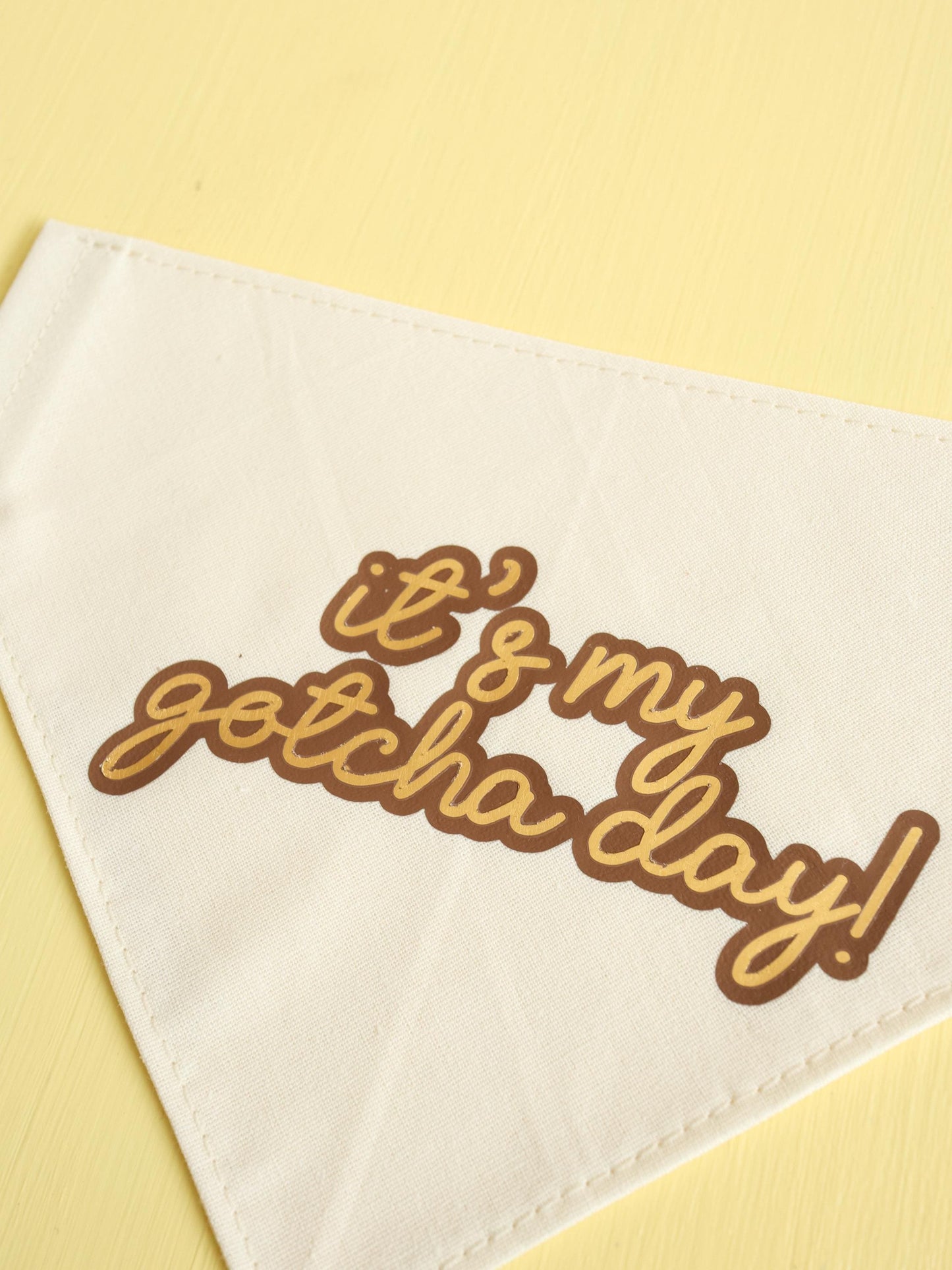 Vinyl patch with 'it's my gotcha day!' text on a beige background