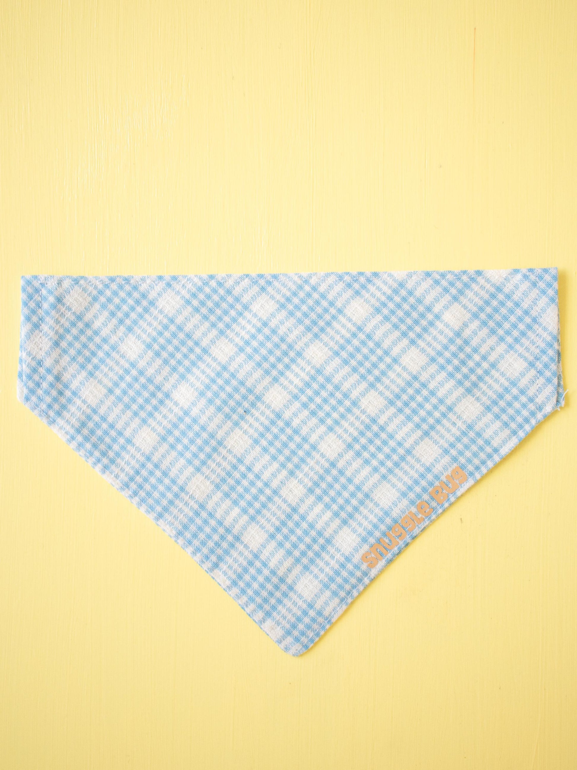 Blue checkered bandana on a yellow background