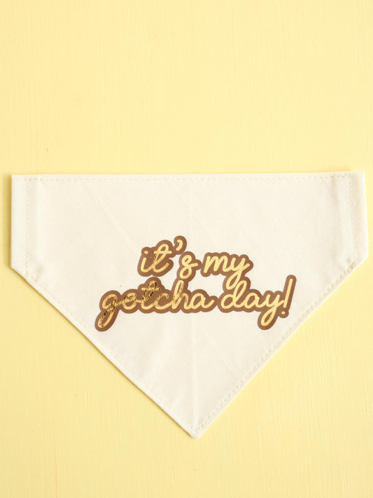 Cream bandana with 'it's my gotcha day!' text on a yellow background