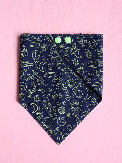 Navy blue bandana with green celestial pattern on a pink background
