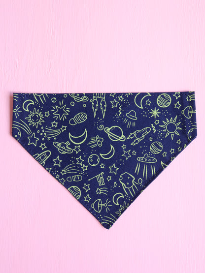 Navy blue bandana with space-themed green patterns on a pink background