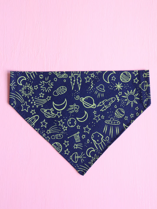 Navy blue bandana with space-themed green patterns on a pink background