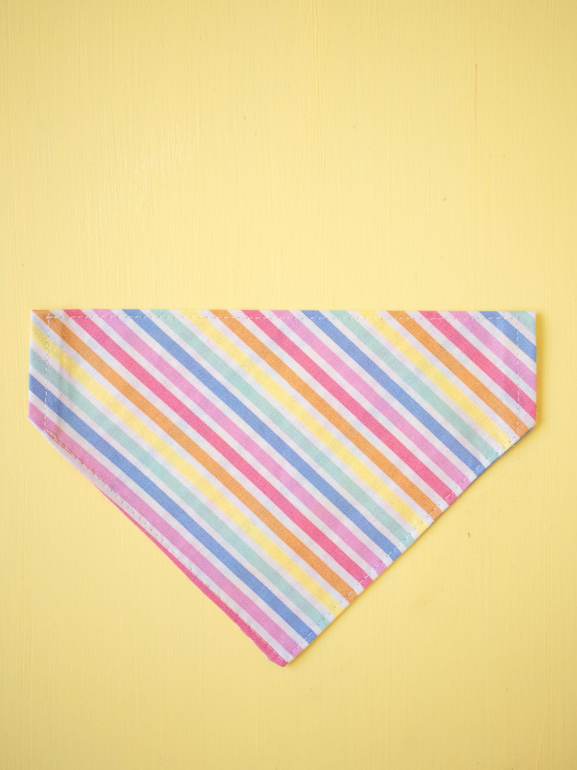 Multicolored striped bandana on a yellow background